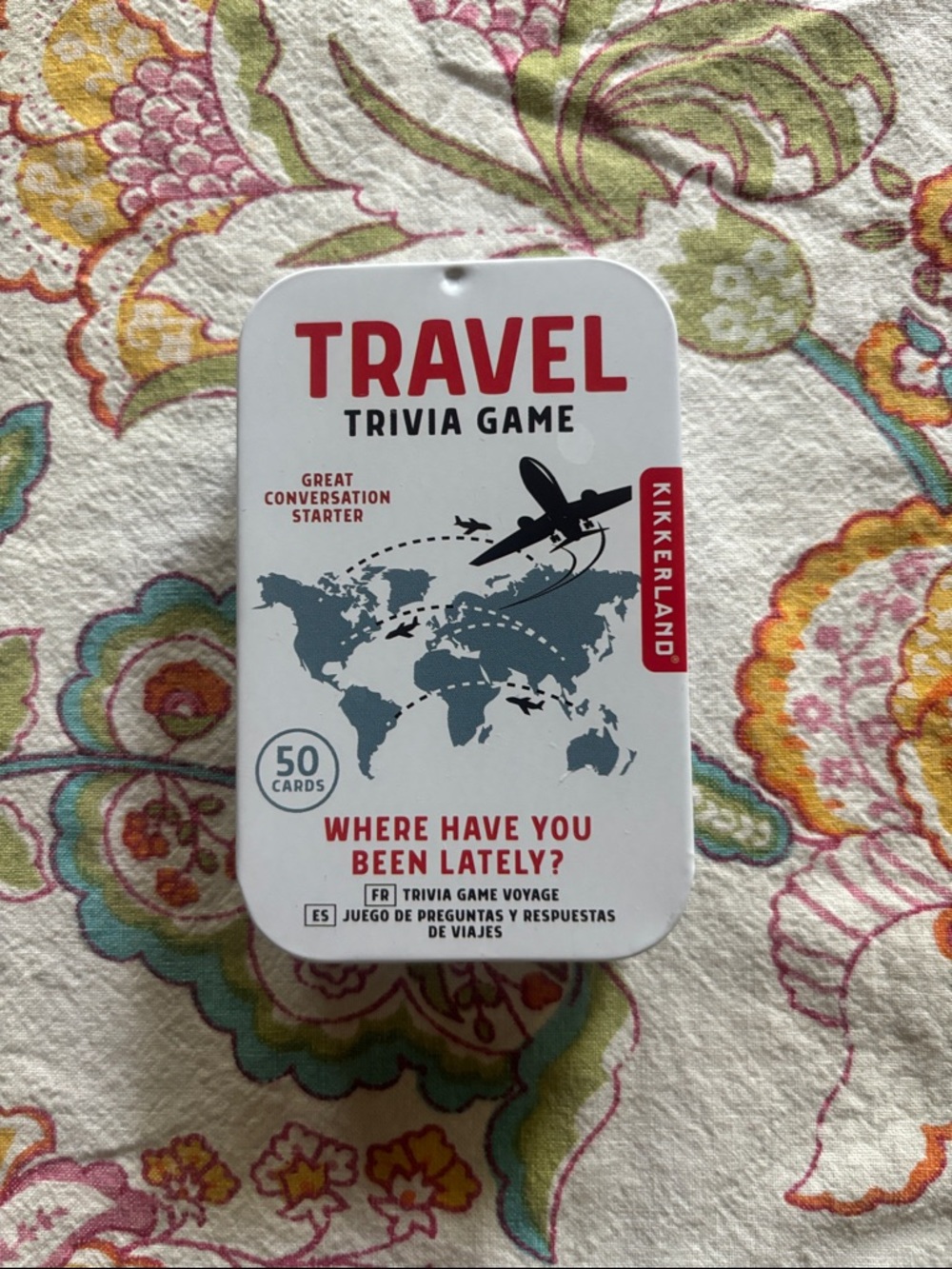 Kikkerland Travel Trivia Game Tin – White, Red & Gray